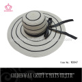 white and black paper lady hats with ribbon floppy women top hats